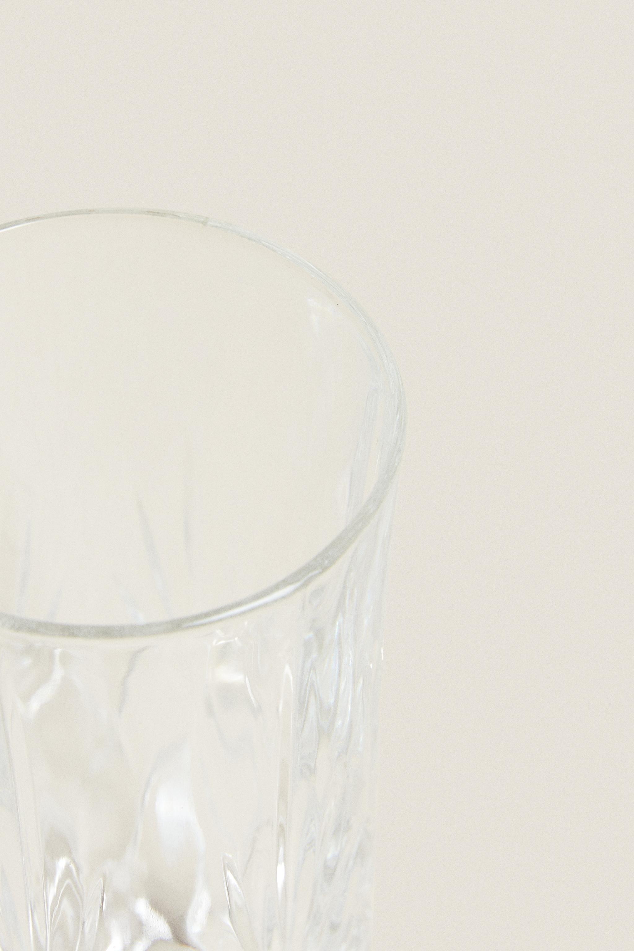 TALL TUMBLER WITH RAISED DESIGN